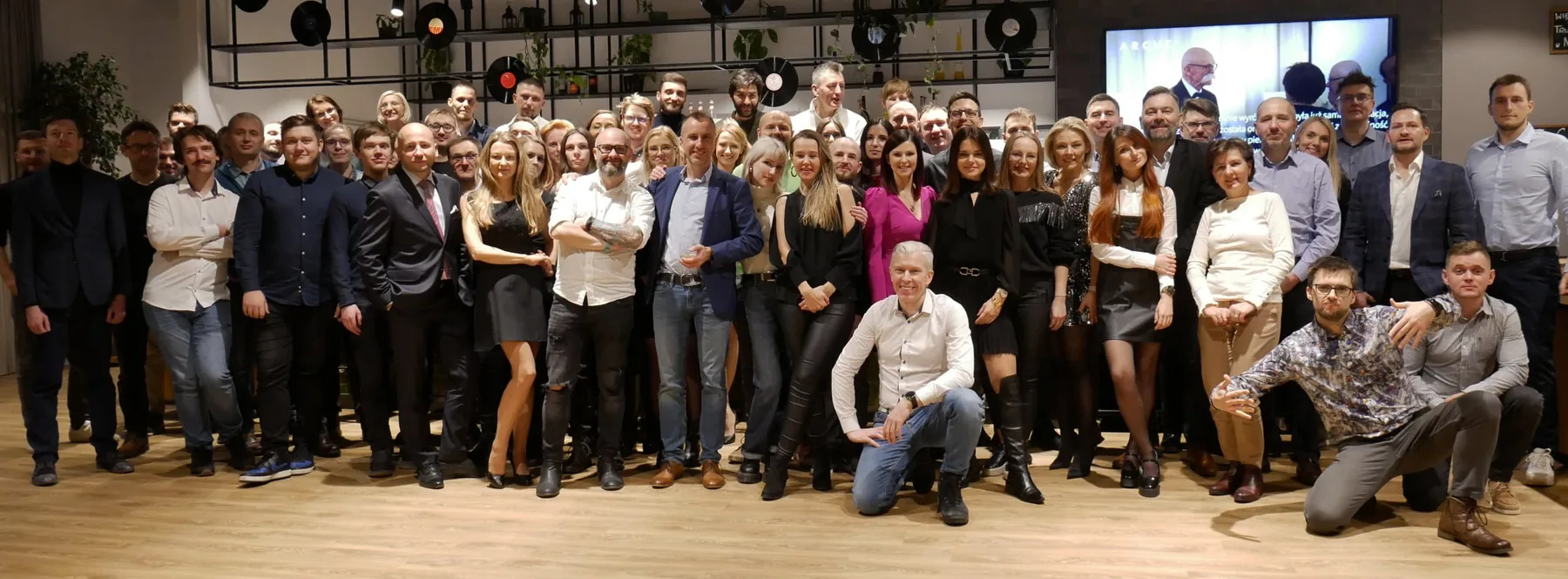 The Astrafox team: dozens of people in a group photo at the company’s office
